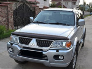 Mitsubishi Pajero Sport 1996–2007 Huvdeflektor (SIM) foto 1