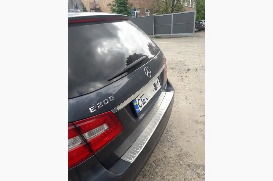 Mercedes E-class W212 2009–2016 Bakre stötfångarskydd OmsaLine (2009-2013, SW, rostfritt stål) Foto 1