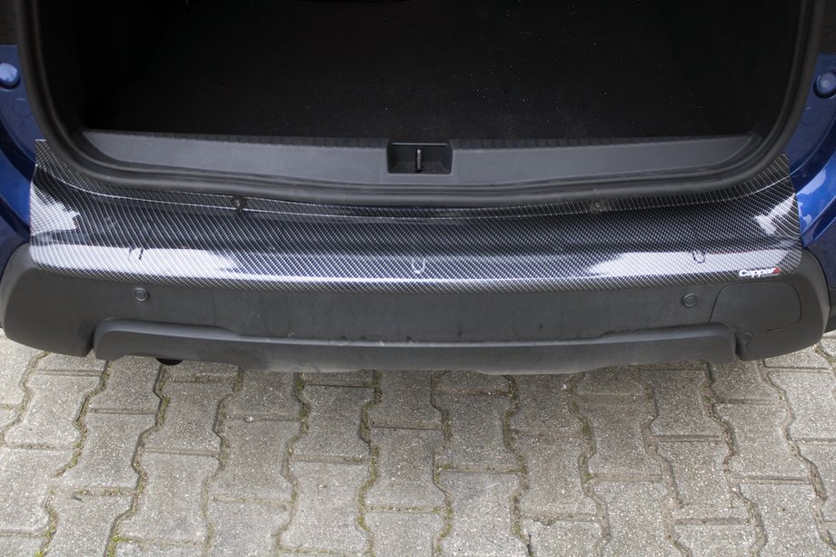 Dacia Duster 2018–2024 Bakre stötfångarskydd EuroCap (ABS, kolfiberlook) Image