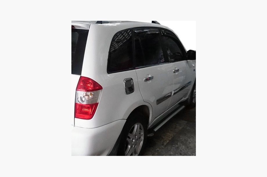 Chery Tiggo 1 2005–2016 Kåpa till tanklock (Omsa, rostfritt stål) Image