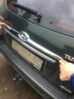 Hyundai Tucson JM 2004– Plastlist ovanför registreringsskylten foto 5