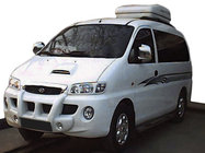 Hyundai H200, H1, Starex 1998–2007 Centralt stötfångarläpp med urtag för dimljus (för lackering) foto 1