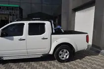 Nissan Navara 2006–2015 Sidosteg X5-typ (2 st, aluminium) foto 3