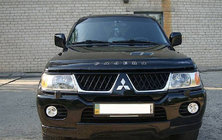 Mitsubishi Pajero Sport 1996–2007 Huvdeflektor (VIP) foto 1