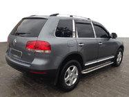 Volkswagen Touareg 2002–2010 Takräcken i krom (plastfötter) Metallfot foto 1