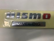 Nissan Patrol Y62 2010–2024 Nismo-emblem foto 1