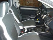 Mitsubishi Outlander 2006–2012 Bilklädsel SoyuzAuto Premium foto 1