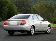 Toyota Camry 2001–2006 Kromlist ovanför registreringsskylten foto 1