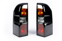 Nissan Patrol Y61 1997–2011 Baklyktor Dark Safari (2004-2008, 2 st) foto 1
