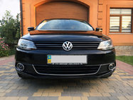 Volkswagen Jetta 2011–2018 Rostfria dimljusramar (2 st) foto 1