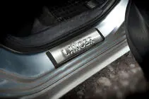 Mitsubishi Lancer X 2008– Instegslister (OMSA, 4 st, rostfritt stål) foto 4