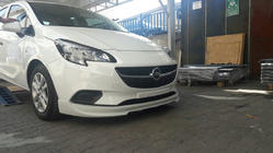 Opel Corsa E 2015–2019 Främre nedre läppspoiler (för lackering) foto 1