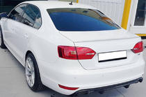 Volkswagen Jetta 2011–2018 OEM-spoiler (för lackering) foto 1