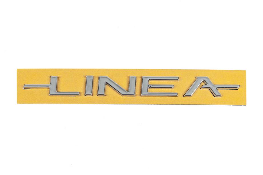 Fiat Linea 2006–2018 Linea modellbeteckning emblem 51767266 (180 mm x 16 mm) Image