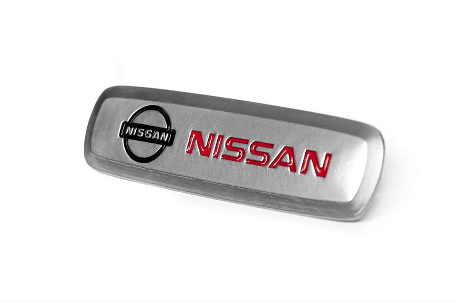 Nissan Aluminiumemblem för bilmattor (1 st) Foto 2