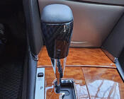 Toyota Land Cruiser Prado 150 2009–2023 Växelspaksknopp (svart läder + kolfiber) foto 2