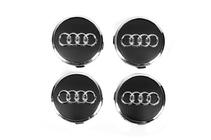 Audi Fälgcentrumkåpor 57/61 mm med ring (4 st, svarta) foto 1