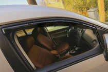 Volkswagen Caddy 2015–2020 Vindavvisare fönster, insticksmodell Niken Luxury (2 st) foto 1