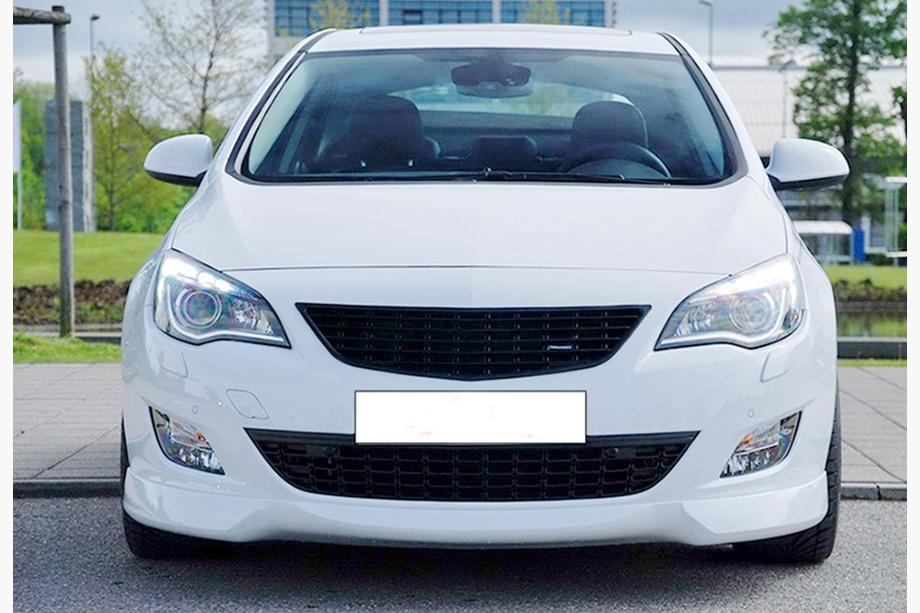 Opel Astra J 2009–2015 Främre frontläpp (bumper lip) DPT V-4 (för lackering) Image