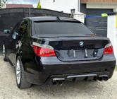 BMW 5-serien E60/E61 2003–2010 Bakre diffuser DPT V-2 (för M-Sport, svart högglans) foto 2