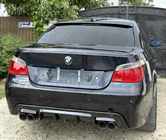 BMW 5-serien E60/E61 2003–2010 Bakre diffuser DPT V-2 (för M-Sport, svart högglans) foto 1