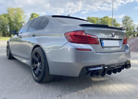 BMW 5-serien F10/F11 2010–2016 Bakre diffuser CS-Style DPT (för M5, svart högglans, vakuumformad) foto 1