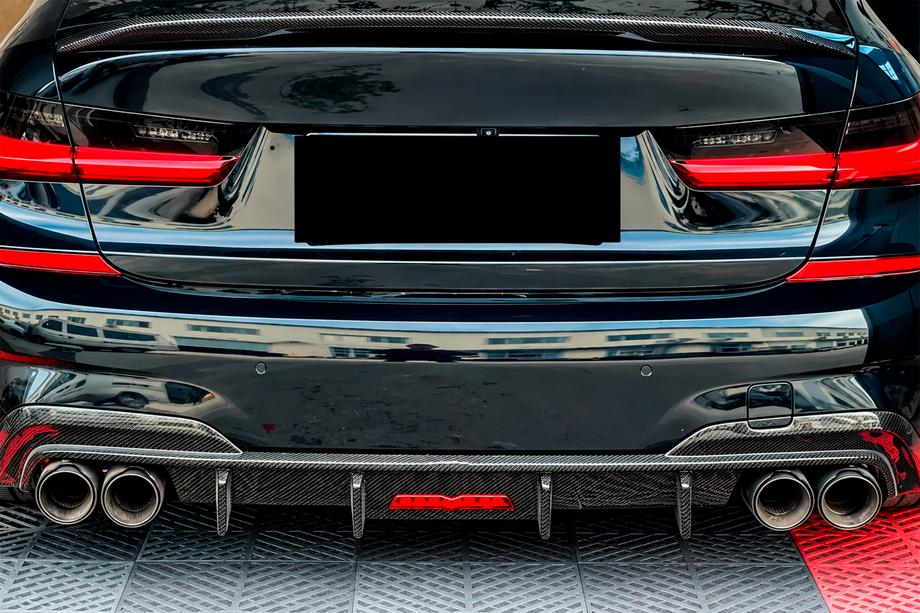 BMW 3-serien G20/G21 2018– Bakre stötfångardiffusor V6 (för M-Sport 2018-2022, kolfiber) Foto 3