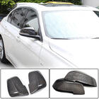 BMW 1-serie E81/E82/E87/E88 2004–2011 Kolfiber spegelkåpor V1 foto 1