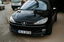 Peugeot 206 1998–2024 Främre nedre läppspoiler (för lackering) foto 1