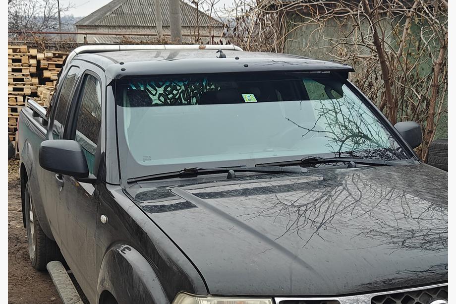Nissan Navara 2006–2015 Solskydd till vindrutan (på ram) Image