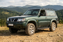 Nissan Patrol Y61 1997–2011 Sidosteg Allmond Black (2 st, aluminium) foto 1