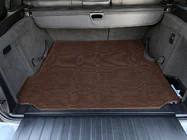 BMW X5 E70 2007–2013 Gummimatta till bagageutrymmet Carsuit (Brun) foto 1