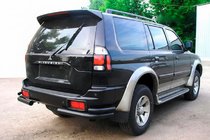 Mitsubishi Pajero Sport 1996–2007 Bakre dubbla hörnbågar Black (2 st, rostfritt stål) foto 1
