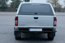Nissan NP300 1999–2015 Bakre skyddsbåge AK004 Black (rostfritt) foto 2