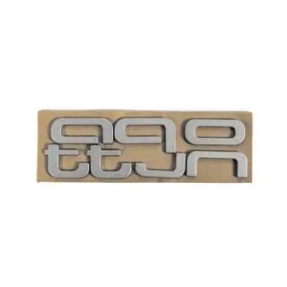 Quattro Grey emblem foto 2
