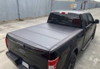 Toyota Hilux 2006–2015 4-delat vikbart flaklock (2011-2015) foto 1