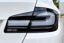 BMW 5-serien F10/F11 2010–2016 Bakljus (Black LCI-design) foto 1