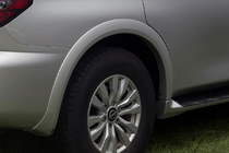 Nissan Armada 2016–2024 Bakre hjulhusbreddare (original, begagnat) foto 1