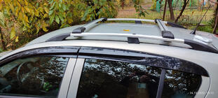 Opel Astra H 2004–2013 Tvärbalkar för vanliga takrails, låsbara med nyckel (2 st) Svart foto 1