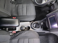 Volkswagen Caddy 2004–2010 Armstöd V1 (i mugghållaren) foto 6