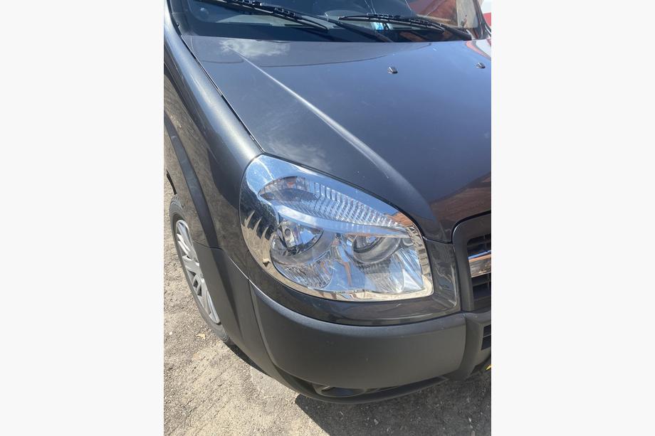 Fiat Doblo I 2005–2010 Strålkastaromfattningar (2 st, rostfritt stål) OmsaLine – italienskt rostfritt stål Foto 2