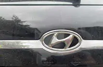Hyundai Tucson JM 2004– Emblem (självhäftande dekal, 125 mm (65 mm)) foto 1