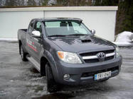 Toyota Hilux 2006–2015 Vindrutesolskydd (med fästen) foto 2