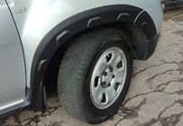 Dacia Duster 2008–2018 Hjulhuslister med utstick (8 st, plast) foto 11