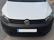 Volkswagen Caddy 2010–2015 Främre emblem 1T0 853 601E foto 2