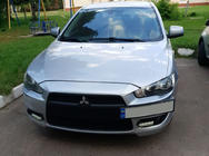 Mitsubishi Lancer X 2008– Registreringsskylthållare (plast) foto 3