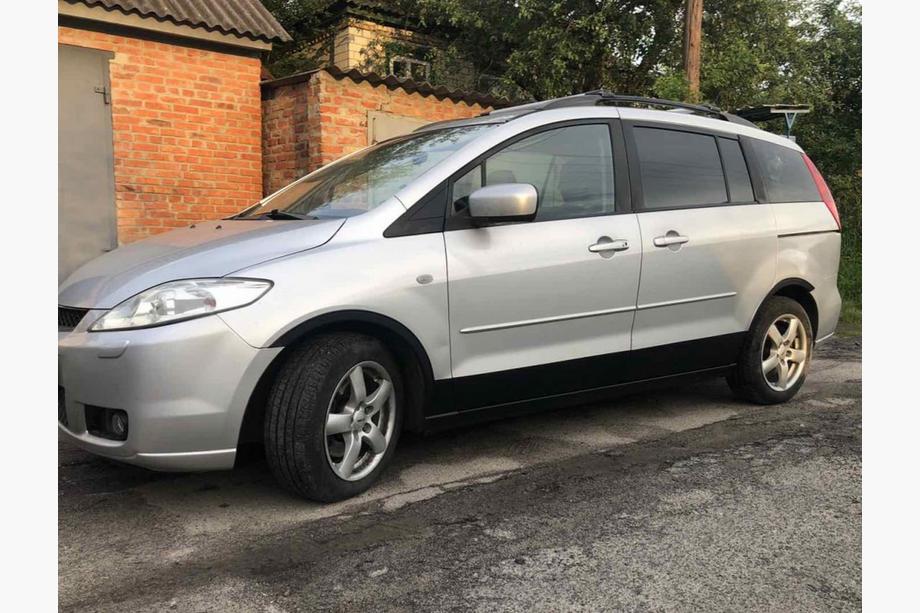 Mazda 5 2005–2009 Hjulhuslister (4 st, svarta) Image