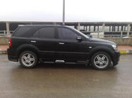 Kia Sorento I BL 2002–2009 Meliset sidokjolar (2 st, för lackering) foto 1