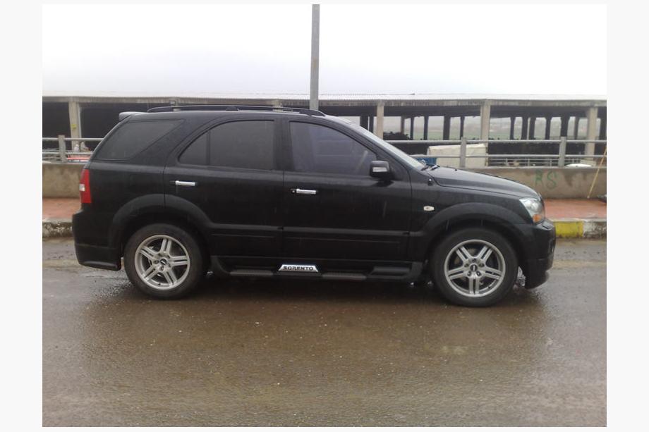 Kia Sorento I BL 2002–2009 Meliset sidokjolar (2 st, för lackering) Image