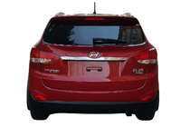 Hyundai IX-35 2010–2015 Kromlist ovanför registreringsskylten (bred) foto 1